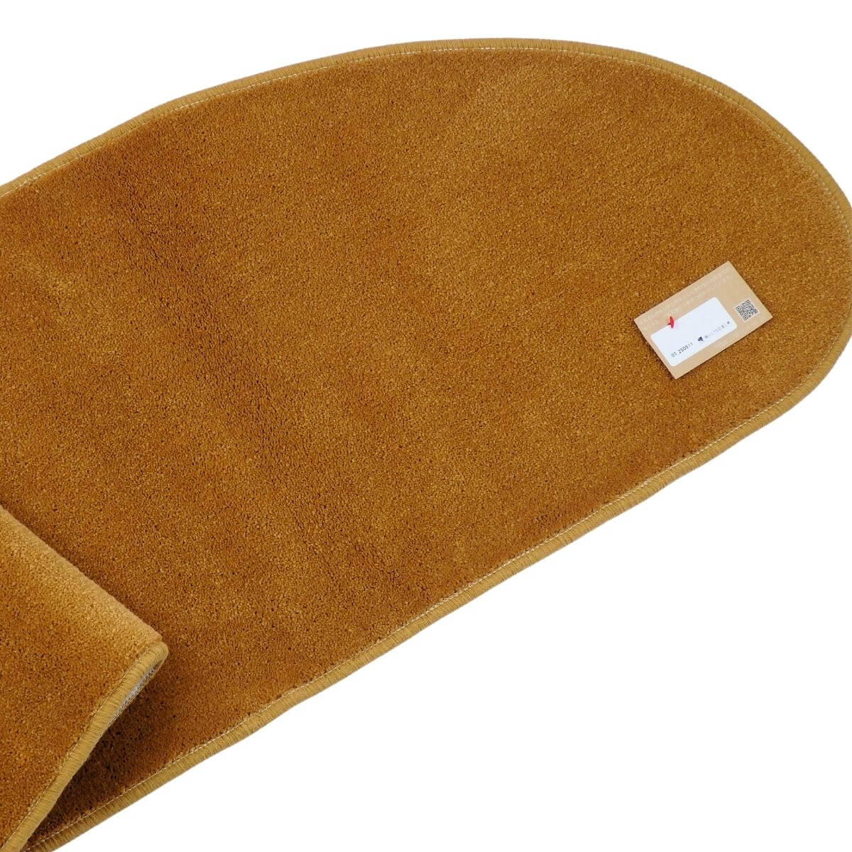 オーカー色のゆりかご型キッチンマット